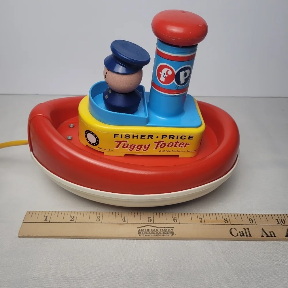 Vintage Fisher Price Tuggy Tooter Pull Along Toy 1967